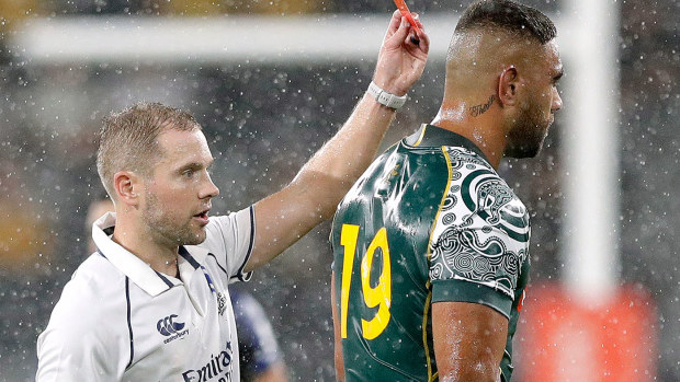 Australia's Lukhan Salakaia-Loto, right, is given a red card by referee Angu Gardner during their Tri-Nations rugby union match against Argentina in 2020.