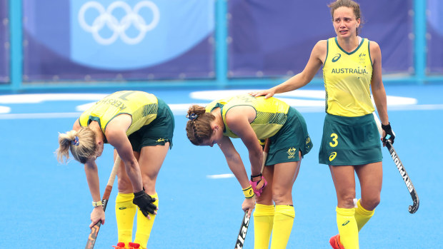 (L-R) Stephanie Anna Kershaw, Kaitlin Nobbs and Brooke Peris of Team Australia react after the 1-0 loss after the Women's Quarterfinal match between Australia and India on day ten of the Tokyo 2020 Olympic Games at Oi Hockey Stadium on August 02, 2021 in Tokyo, Japan. (Photo by Alexander Hassenstein/Getty Images)