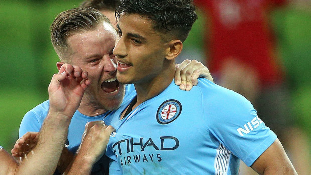 Daniel Arzani at Melbourne City is congratulated by teammate Scott Jamieson after scoring