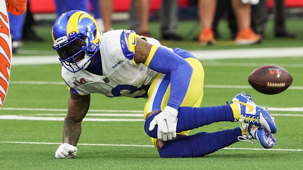 Los Angeles Rams wide receiver Odell Beckham Jr. (3) falls after injuring his knee in the first half of Super Bowl 