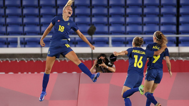 Rolfo celebrates after scoring against Australia.