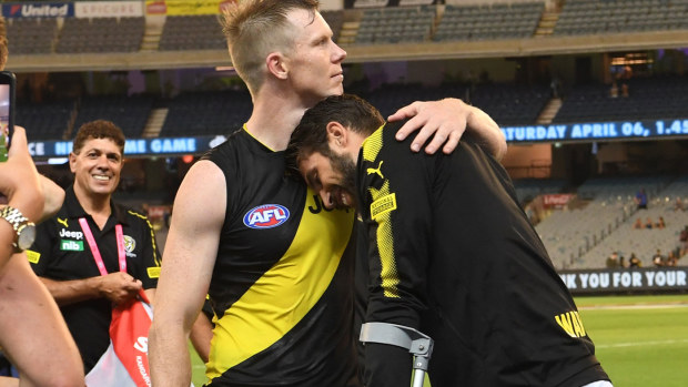 Riewoldt and Rance embrace