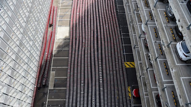 Hundreds of empty luggage trollies are seen stacked at Sydney International Airport in Sydney.
