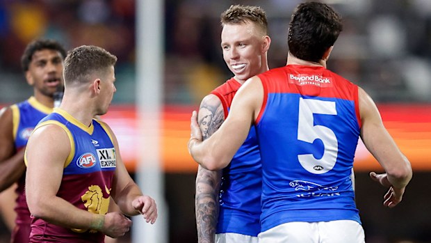 Brisbane Lions skipper Dayne Zorko cops some choice words from Melbourne's James Harmes