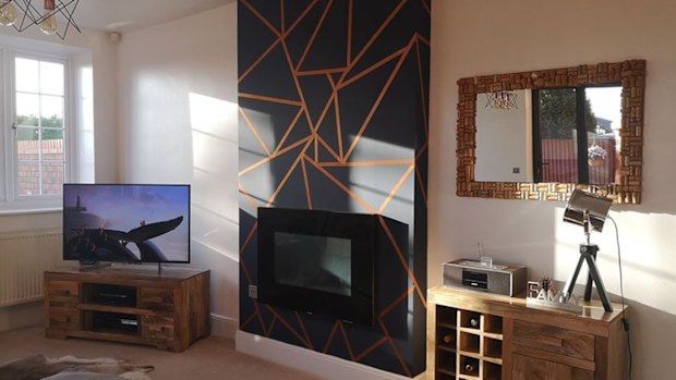 Woman creates stunning feature wall after failing to find wallpaper