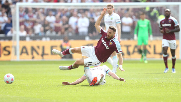 Burnley's Ashley Westwood suffers a bad injury after this challenge on West Ham United's Nikola Vlasic 