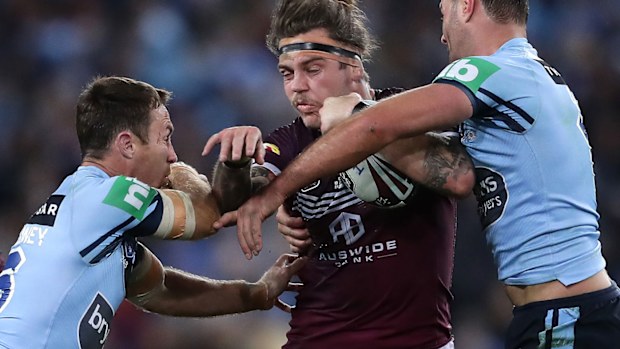 Ethan Lowe is tackled during his only State of Origin match for Queensland, in 2019.