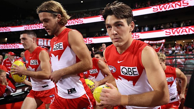 Errol Gulden of the Swans runs onto the field during round seven