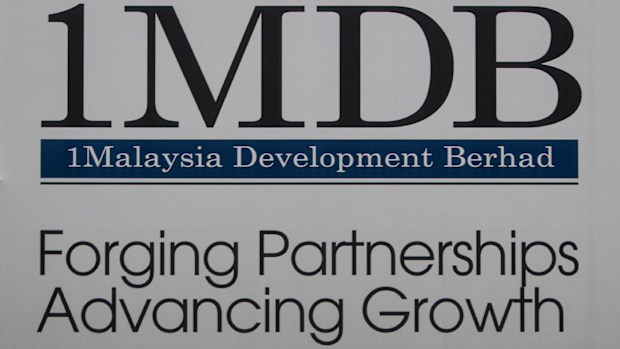 A billboard for state investment fund 1 Malaysia Development Berhad (1MDB) at the fund's flagship Tun Razak Exchange development in Kuala Lumpur, Malaysia. (AP Photo/Joshua Paul, File)
