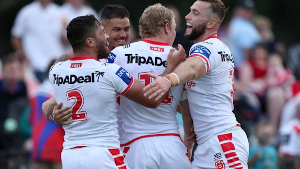 Dragons players celebrate
