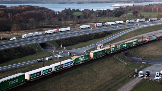 A aerial view of a cargo train with damaged compartments near the Storebaelt bridge, near Nyborg in Denmark.