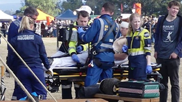 A 21-year-old has been struck in the head with an axe at a medieval festival.