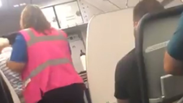 The man was kicked off the flight for 'aggressively disrupting' the safety demonstration, according to the airline.