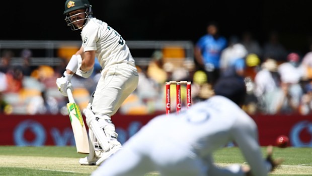 David Warner falls in the opening over of the Gabba Test. (Getty)