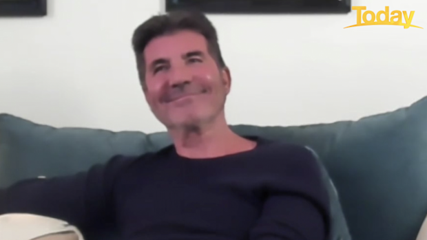 A smiling Simon Cowell chatted to Today's Karl and Ally.