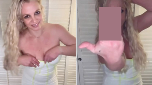 Britney Spears appears defiant as she gives the finger in new video following restaurant 'meltdown'