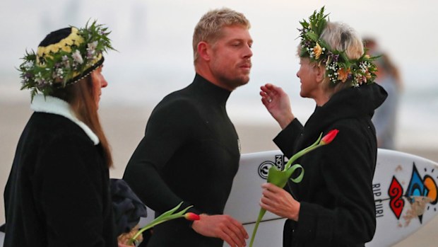 Surfer Mick Fanning attends a paddle out in memory of Alex 'Chumpy' Pullin
