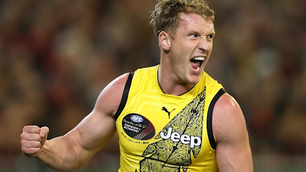 Josh Caddy celebrates after scoring a goal in 2018