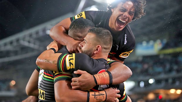Jerome Luai of the Panthers celebrates with Josh Mansour 
