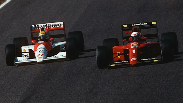 Ayrton Senna (left) and Alain Prost just before they collided at the 1990 Japanese Grand Prix.