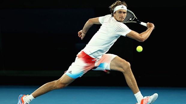 Alexander Zverev of Germany plays a forehand in his first round singles match against Daniel Altmaier 