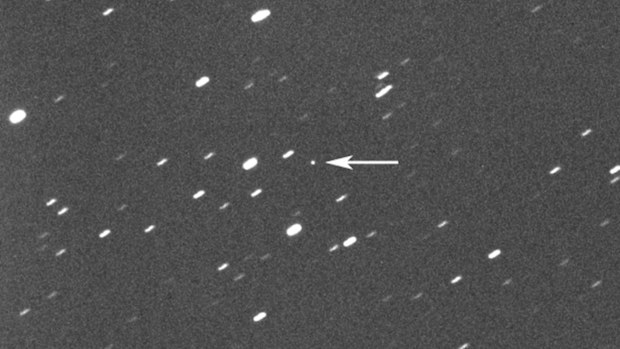 Asteroid 2023 DZ2, indicated by arrow at centre, about 1.8 million kilometres away from the Earth. On Saturday, March 25, 2023, the asteroid, big enough to wipe out a city, will harmlessly zip between Earth and the moon.