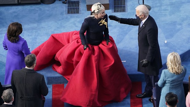 President-elect Joe Biden greets Lady Gaga during the 59th Presidential Inauguration at the U.S. Capitol in Washington, Wednesday, Jan. 20, 2021.