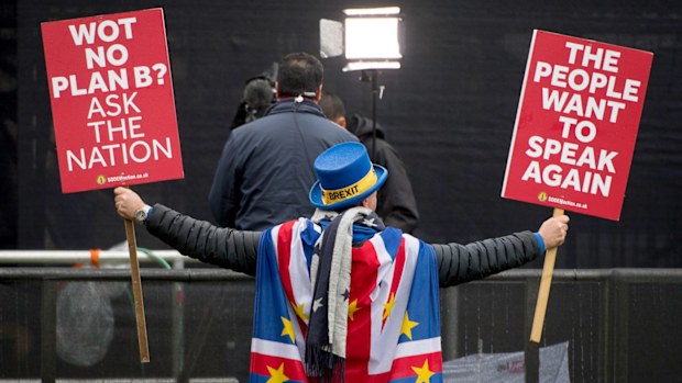 Anti Brexit protestor Steve Bray attempts to appear in shot behind a television crew on Abingdon Green, outside the Houses of Parliament, in Westminster, London.