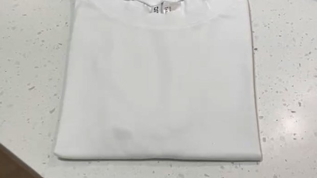 Shirt after grease stain removed with cornstarch or cornflour