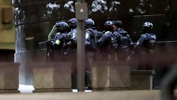 Russian special forces secure the area at the building of the Federal Security Service.