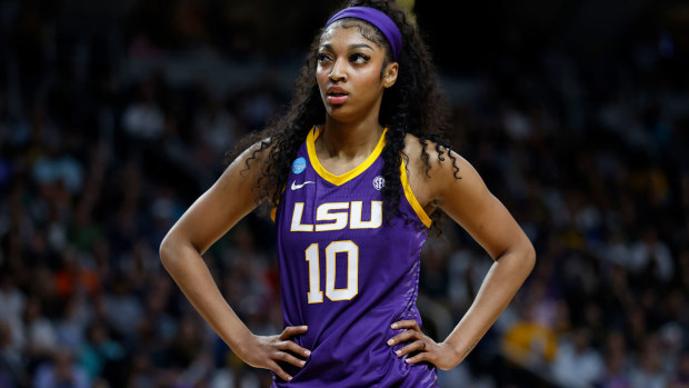 Angel Reese #10 of the LSU Tigers looks on during the first half against the Iowa Hawkeyes in the Elite 8.