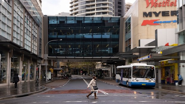 A pedestrian is seen wearing  mask at Bondi Junction on June 21, 2021 in Sydney, Australia. A cluster of COVID-19 cases in Sydney's eastern suburbs continues to grow, causing the government to impose restrictions including mandatory indoor mask-wearing in several jurisdictions. NSW Premier Gladys Berejiklian is urging people to get tested to stop the spread and limit further restrictions.