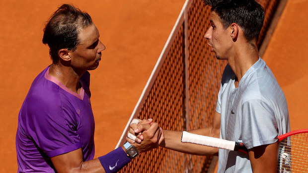 Rafael Nadal and Alexei Popyrin after their match in Madrid.