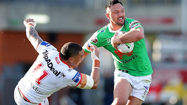 Jordan Rapana of the Raiders is tackled