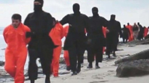 ISIL militants parading kidnapped Christians.