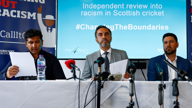 Cricketers Majid Haq and Qasim Sheikh with lawyer Aamer Anwar.