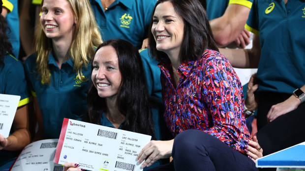 Anna Meares, the Australian Olympic Committee's chef de mission for Paris 2024, poses for a photo with the Dolphins team.