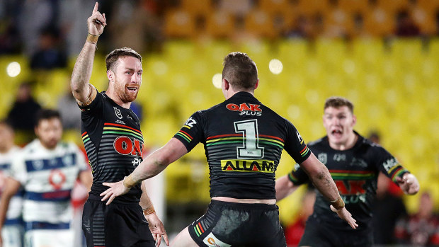 James Maloney of the Panthers celebrates after scoring the golden point to win