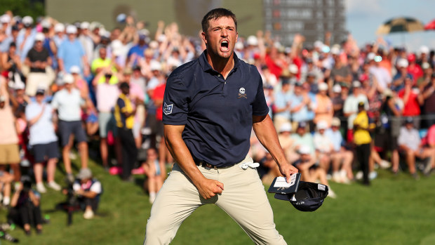 Bryson DeChambeau celebrates after making his putt on the 18th hole during the final round of the PGA Championship at Valhalla Golf Club on Sunday, May 19, 2024 in Louisville, Kentucky. (Photo by Scott Taetsch/PGA of America via Getty Images)