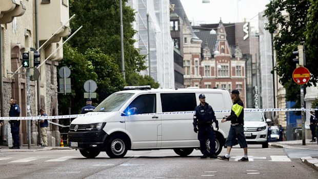 Emergency services attend the scene after a man drove a car into pedestrians in Helsinki. (AAP)