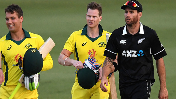 Steve Smith (2nd right) Alex Carey of the Australia XI (centre) shake hands with their opponents