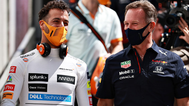 Daniel Ricciardo of McLaren F1 and Red Bull Racing Team Principal Christian Horner