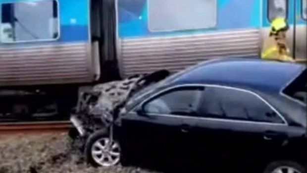 Melbourne driver rescued moments before train hits car | Nine.com.au