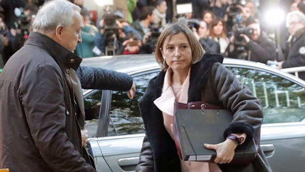 Catalan parliament speaker Carme Forcadell, (right) arrives at court. (Photo: AAP).