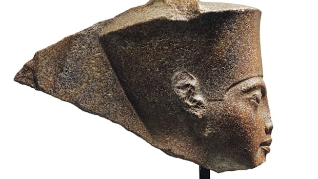 The statue of Tutankhamun has sold in London despite claims it was stolen.