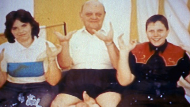 Grady Stiles and two of his children who also had ectrodactyly.