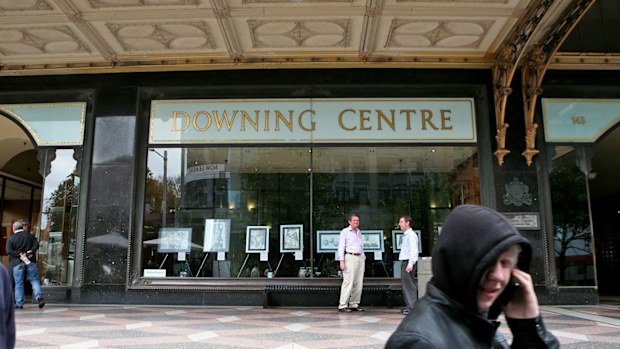 Two bank employees have been charged with defrauding $2.4 million from a Sydney customer.