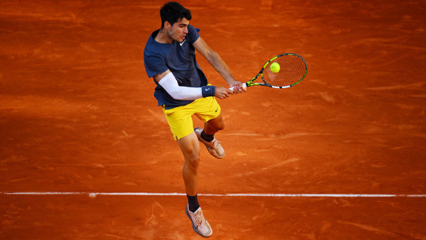 Carlos Alcaraz in action during the French Open final against Alexander Zverev.