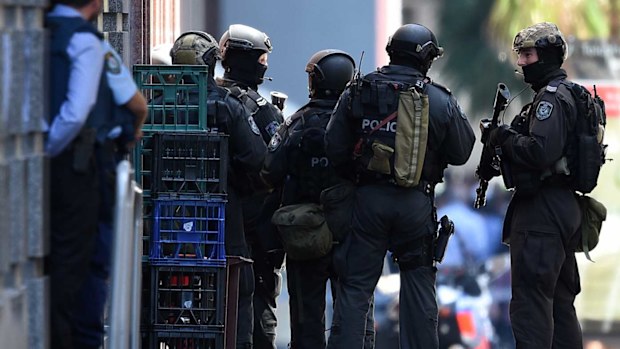 Police outside the Lindt cafe during the 2014 Sydney siege. (AAP)