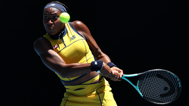 Coco Gauff plays a backhand in their round one singles match against Anna Karolina Schmiedlova during the 2024 Australian Open.